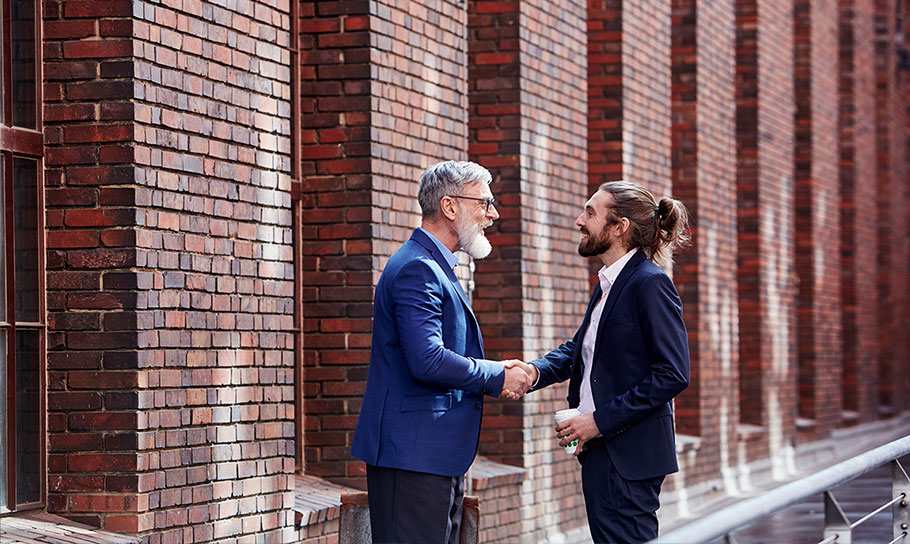 people shaking hands 